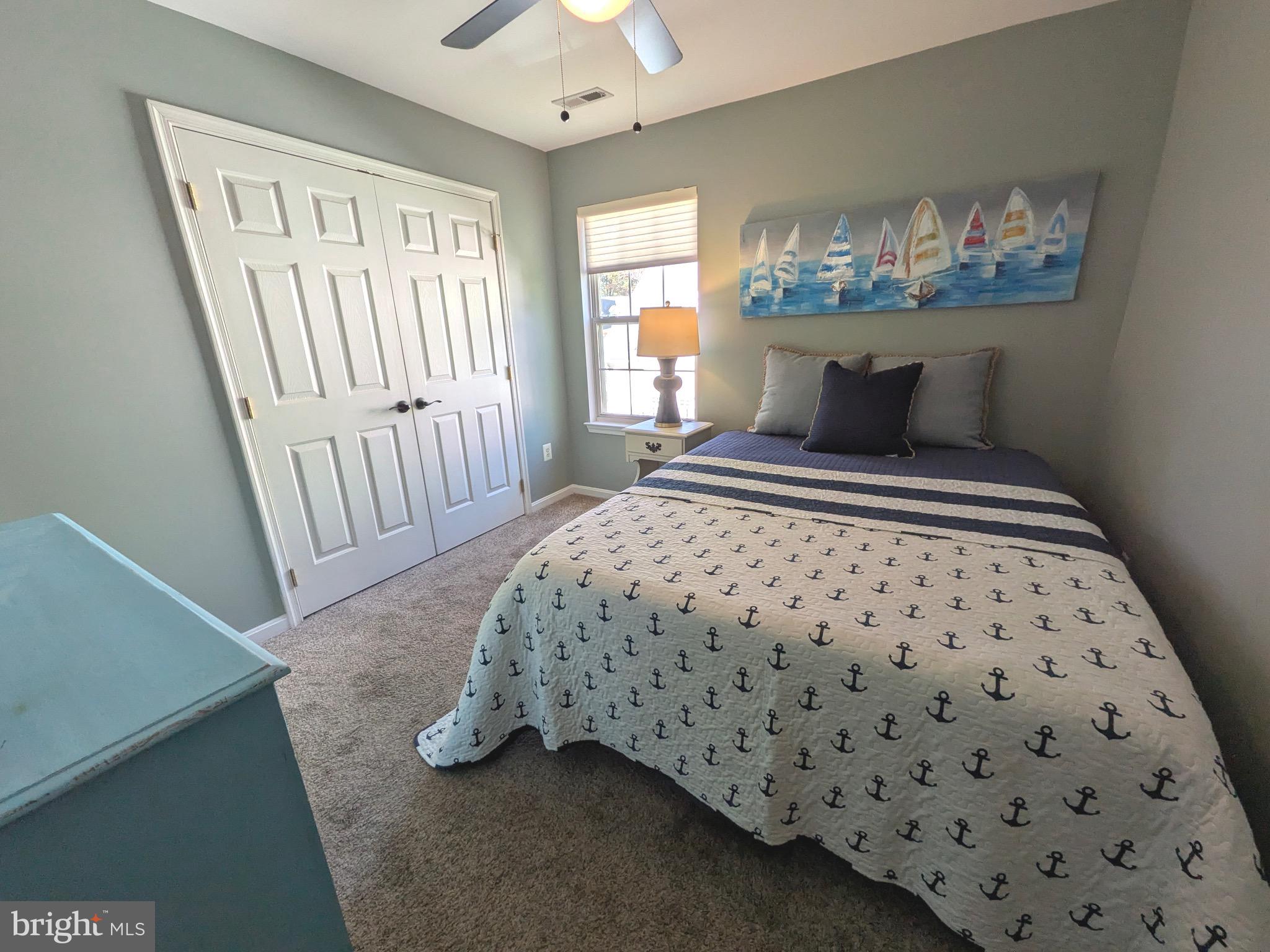 112 Chessie Court Chester, MD 21619 - Photo 28 of 37 a bedroom with a bed and a window