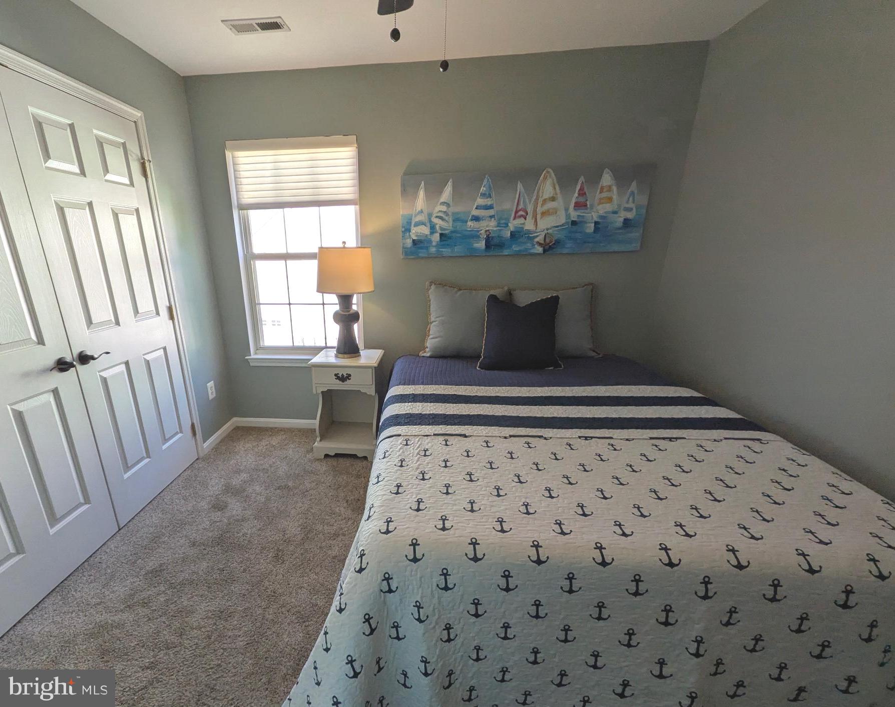 112 Chessie Court Chester, MD 21619 - Photo 29 of 37 a bedroom with a bed and a window