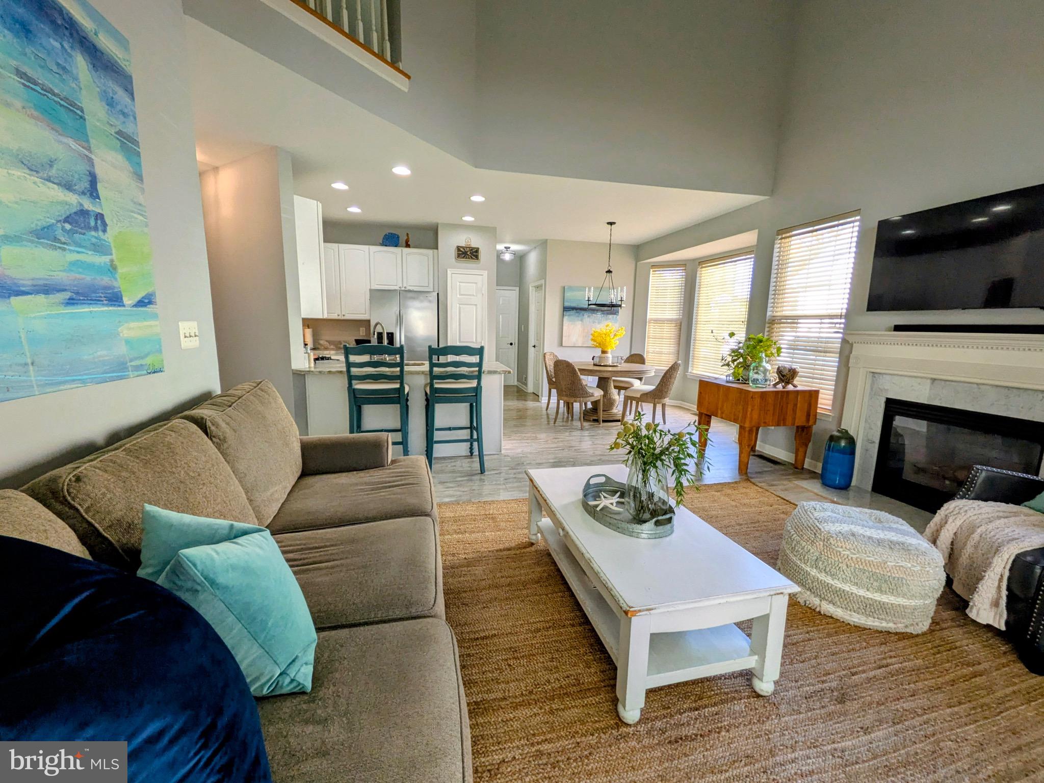 112 Chessie Court Chester, MD 21619 - Photo 3 of 37 a living room with furniture fireplace and a flat screen tv