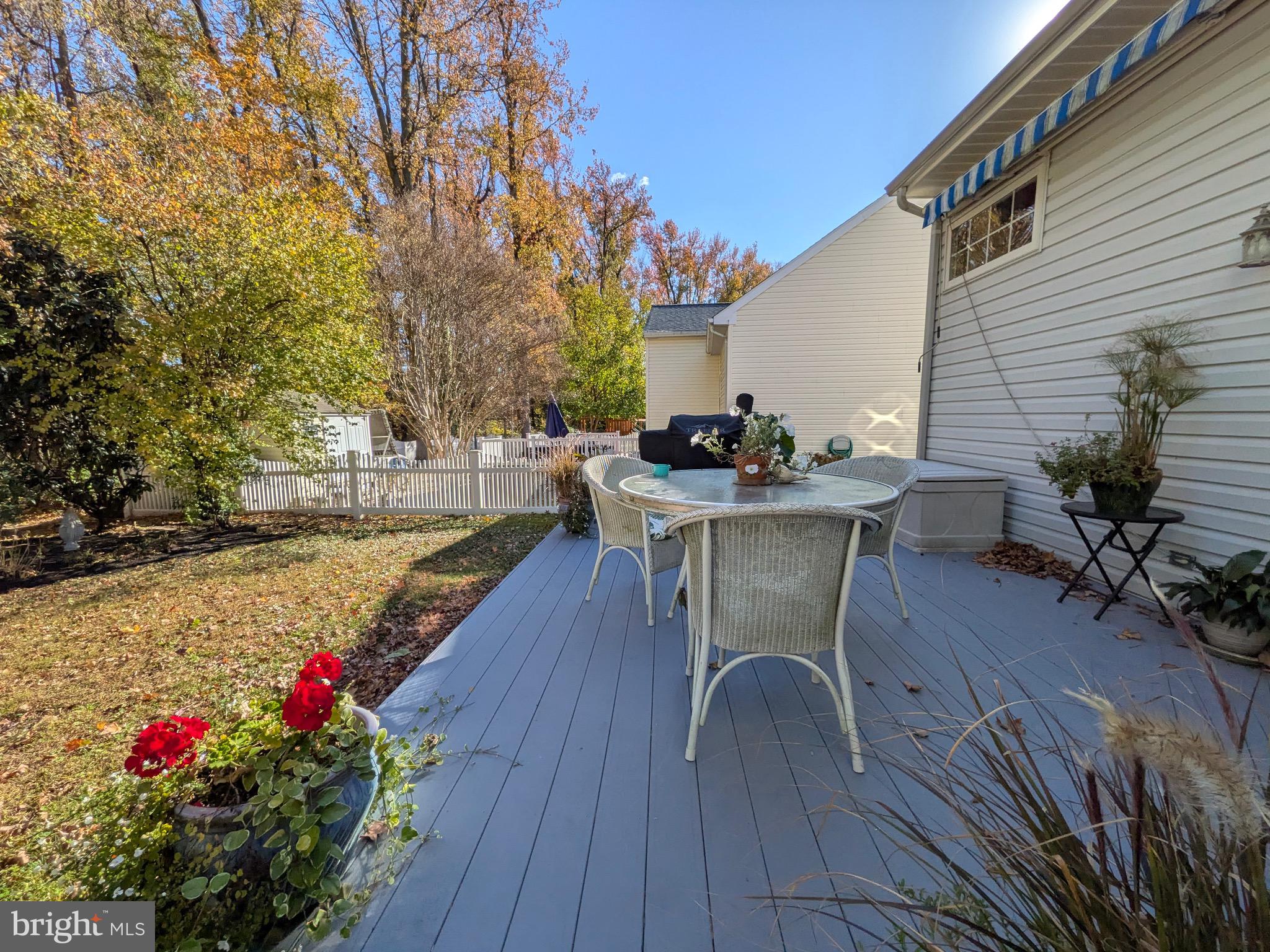 112 Chessie Court Chester, MD 21619 - Photo 34 of 37 a view of a chairs and table on the wooden deck