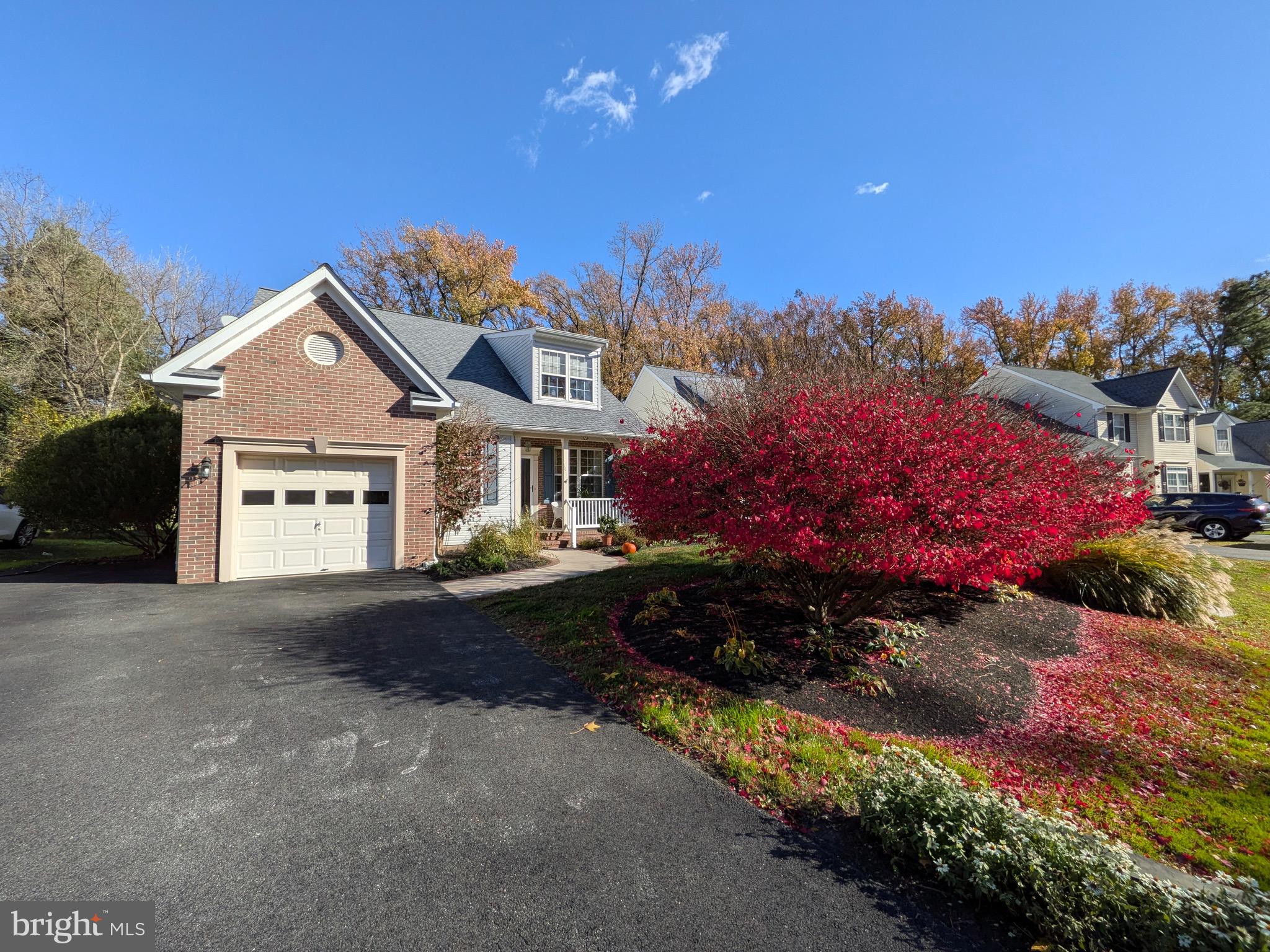 112 Chessie Court Chester, MD 21619 - Photo 35 of 37 a front view of a house with a yard and garage