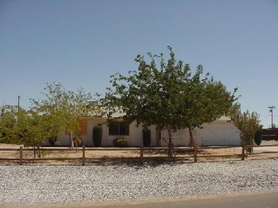 15667 Ute Road Apple Valley, CA 92307 - Photo 1 of 1 a backyard of a house