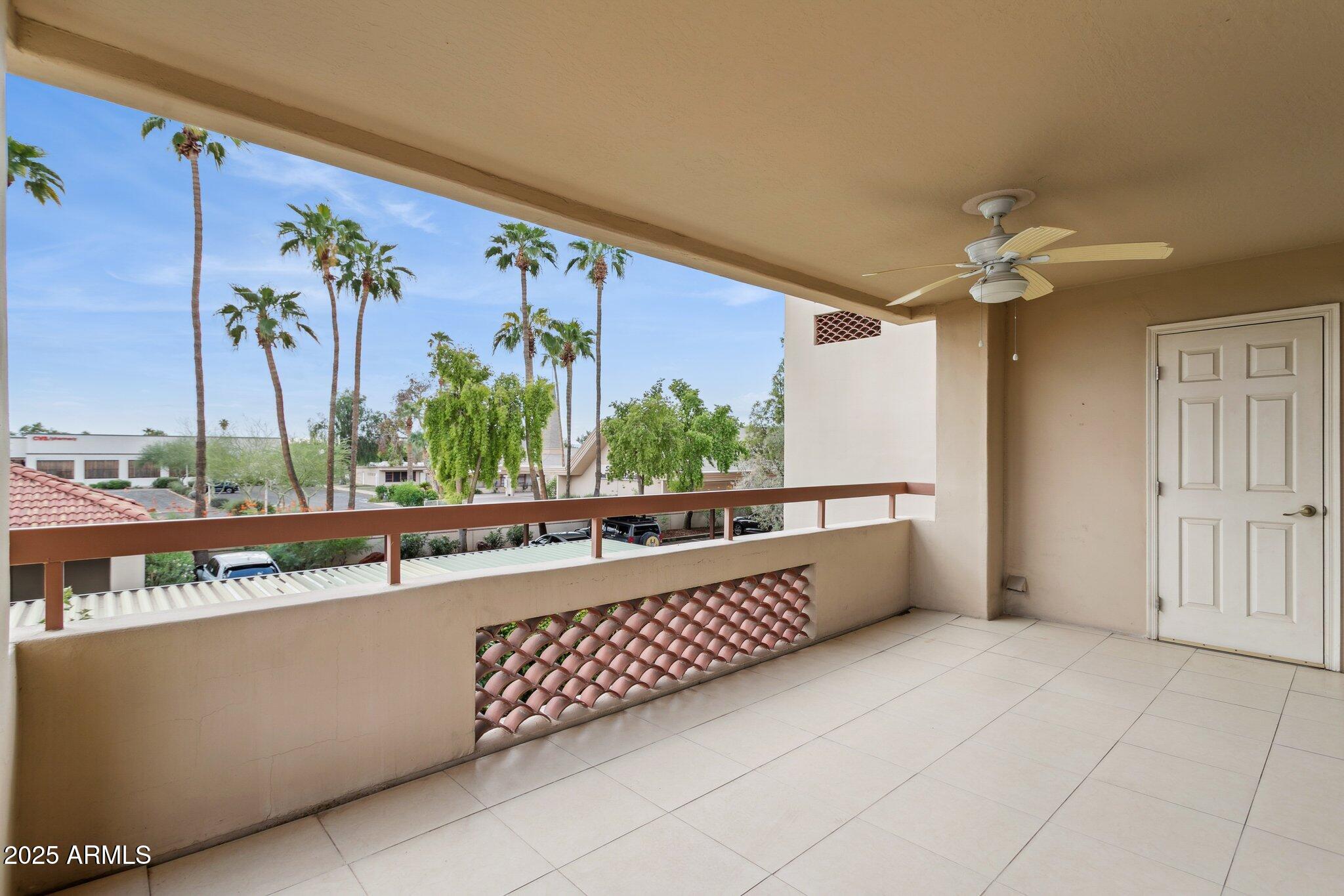 4200 North Miller Road, Unit 220 Scottsdale, AZ 85251 - Photo 20 of 27 en suite bathroom with a tub and a large mirror