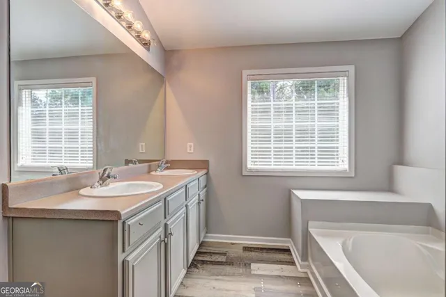 a bathroom with a sink and a bathtub