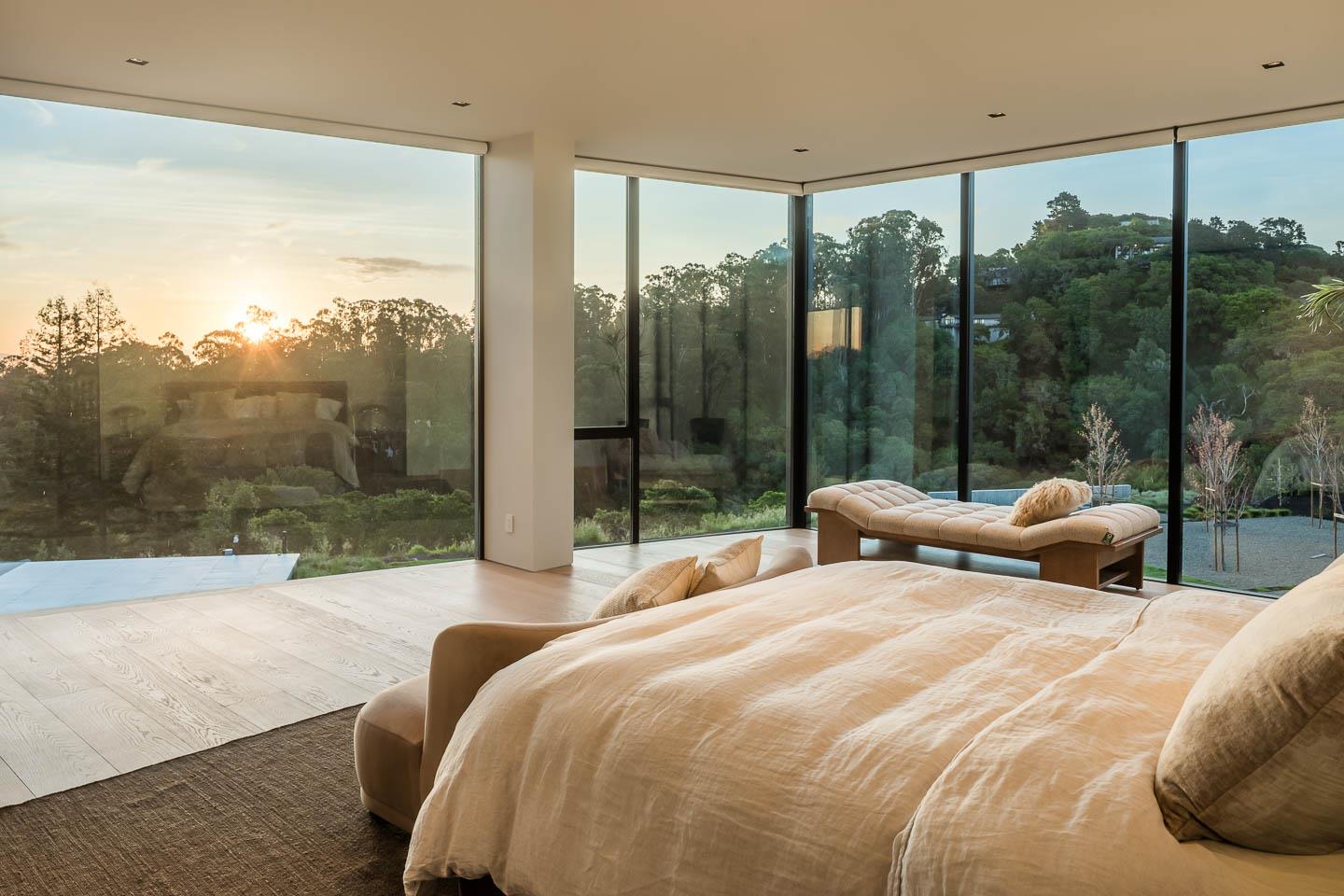 455 Pinehill Road Hillsborough, CA 94010 - Photo 18 of 33 a bedroom with a bed and a large window with balcony view