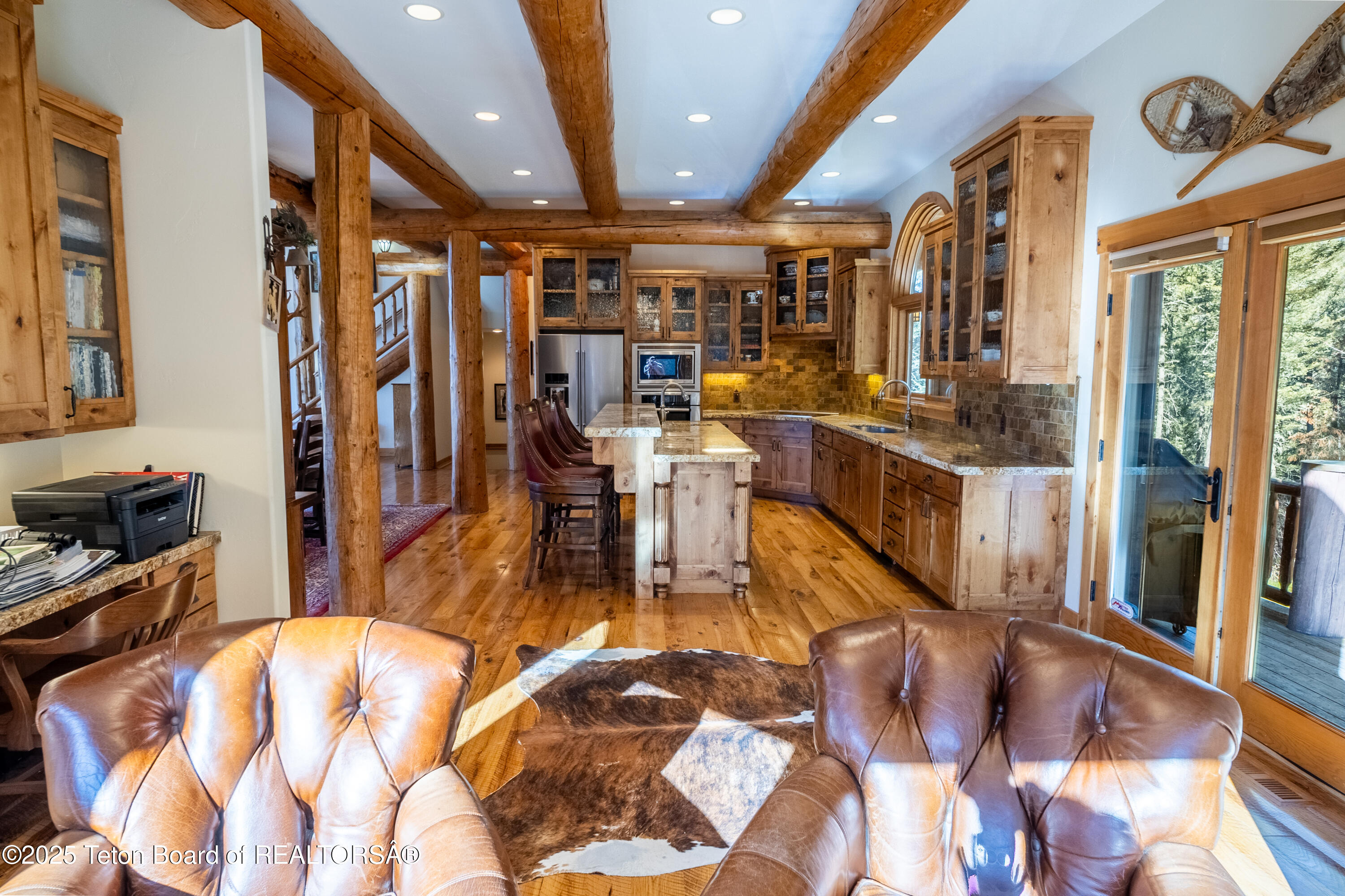 1558 Trail Ridge Road Alpine, WY 83128 - Photo 23 of 49 Seating Area to Kitchen