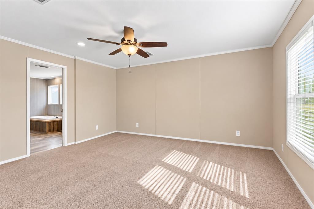 5519 Upper Denton Road Weatherford, TX 76085 - Photo 20 of 40 Carpeted room with a ceiling fan, recessed lighting, and white trim