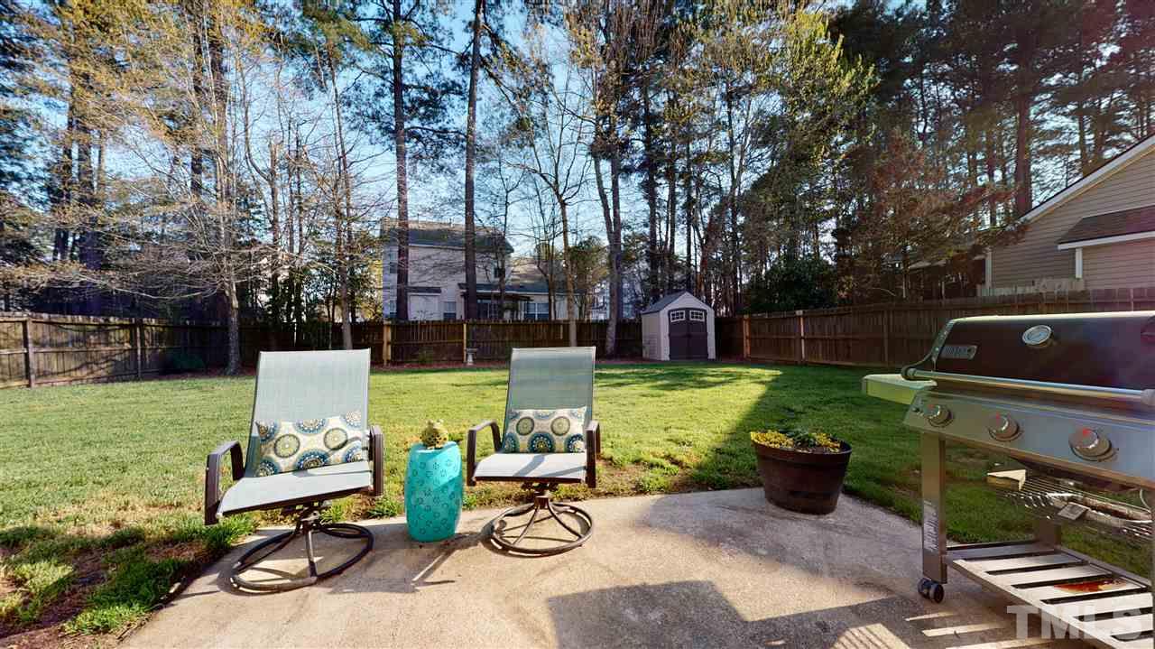 5404 Neuse Forest Road Raleigh, NC 27616 - Photo 26 of 29 a view of a two chairs in a patio