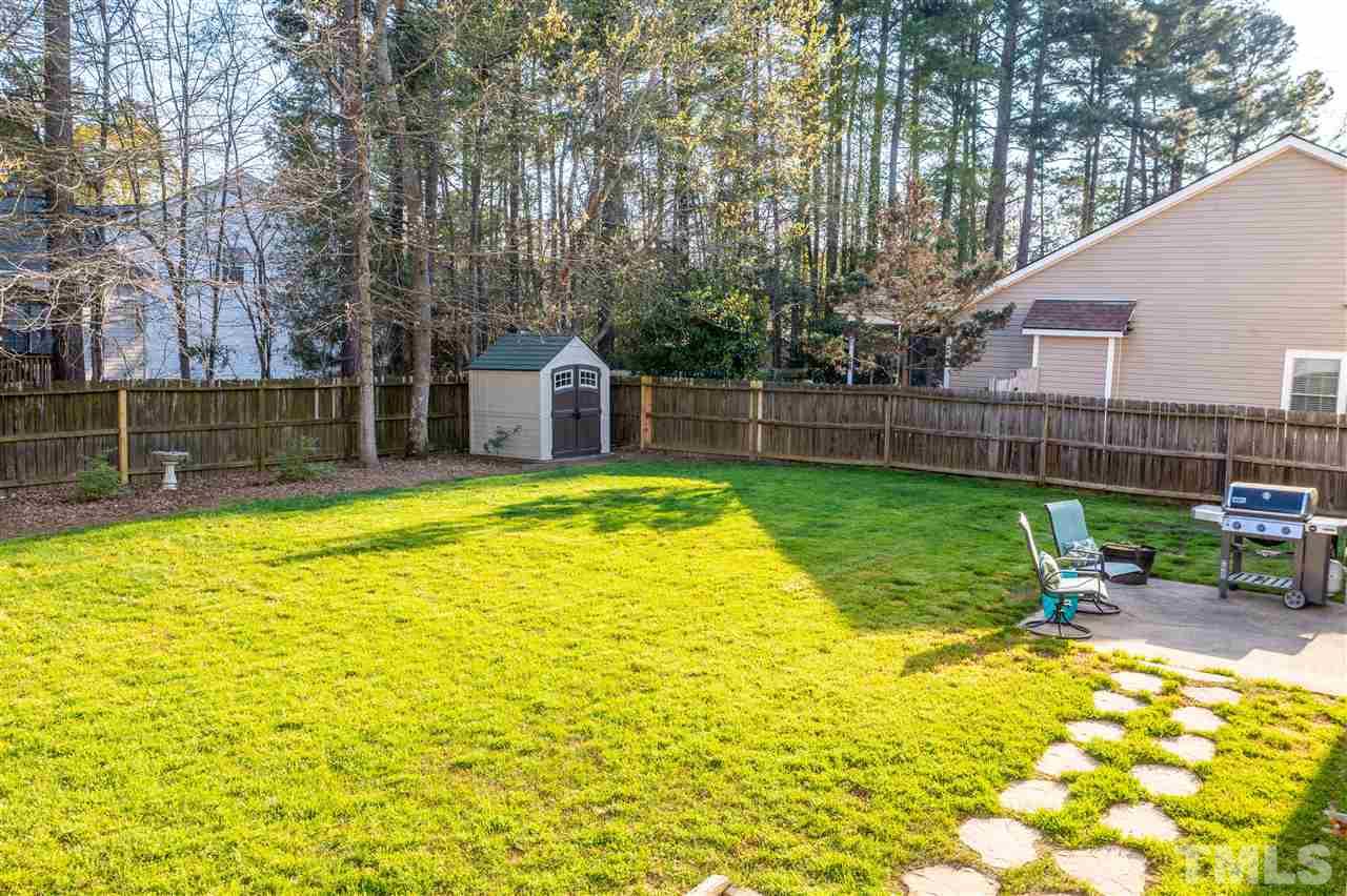 5404 Neuse Forest Road Raleigh, NC 27616 - Photo 28 of 29 a swimming pool with outdoor seating and yard