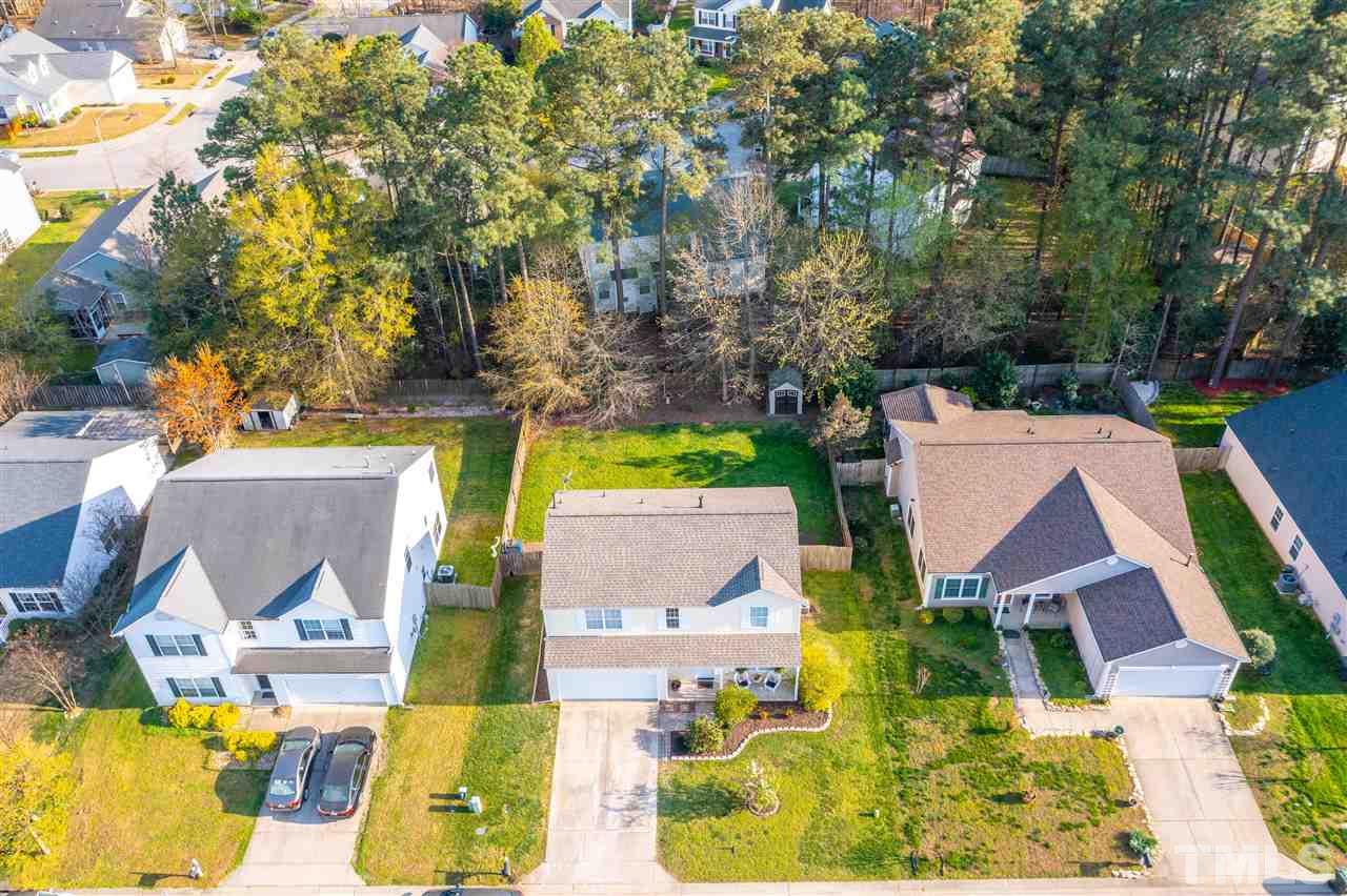 5404 Neuse Forest Road Raleigh, NC 27616 - Photo 4 of 29 an aerial view of residential houses with yard