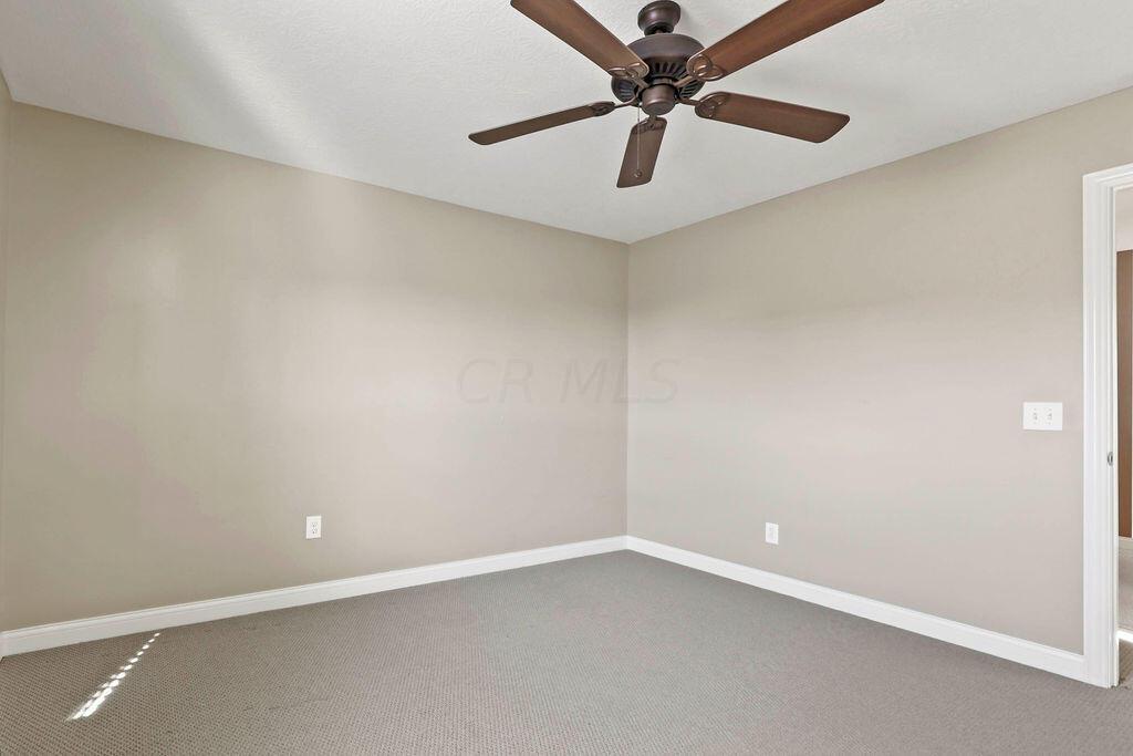 6163 Jennis Road Westerville, OH 43081 - Photo 33 of 44 • Tan carpet
• Tan painted walls
• Ceiling fan
• 2” blinds