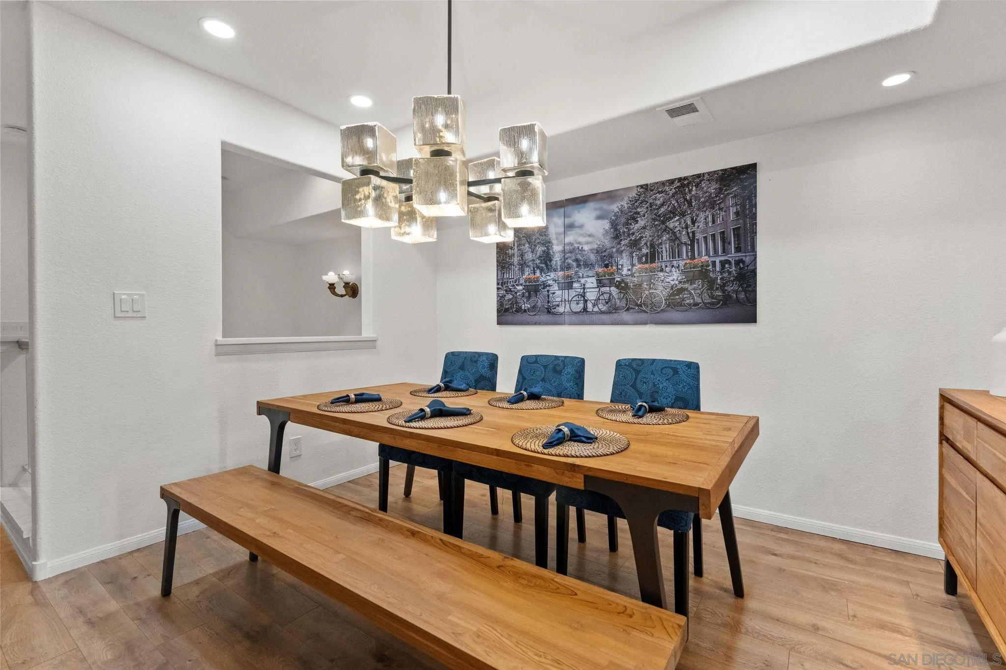2842 Torrey Pines Road La Jolla, CA 92037 - Photo 15 of 45 a dining room with a table and chairs