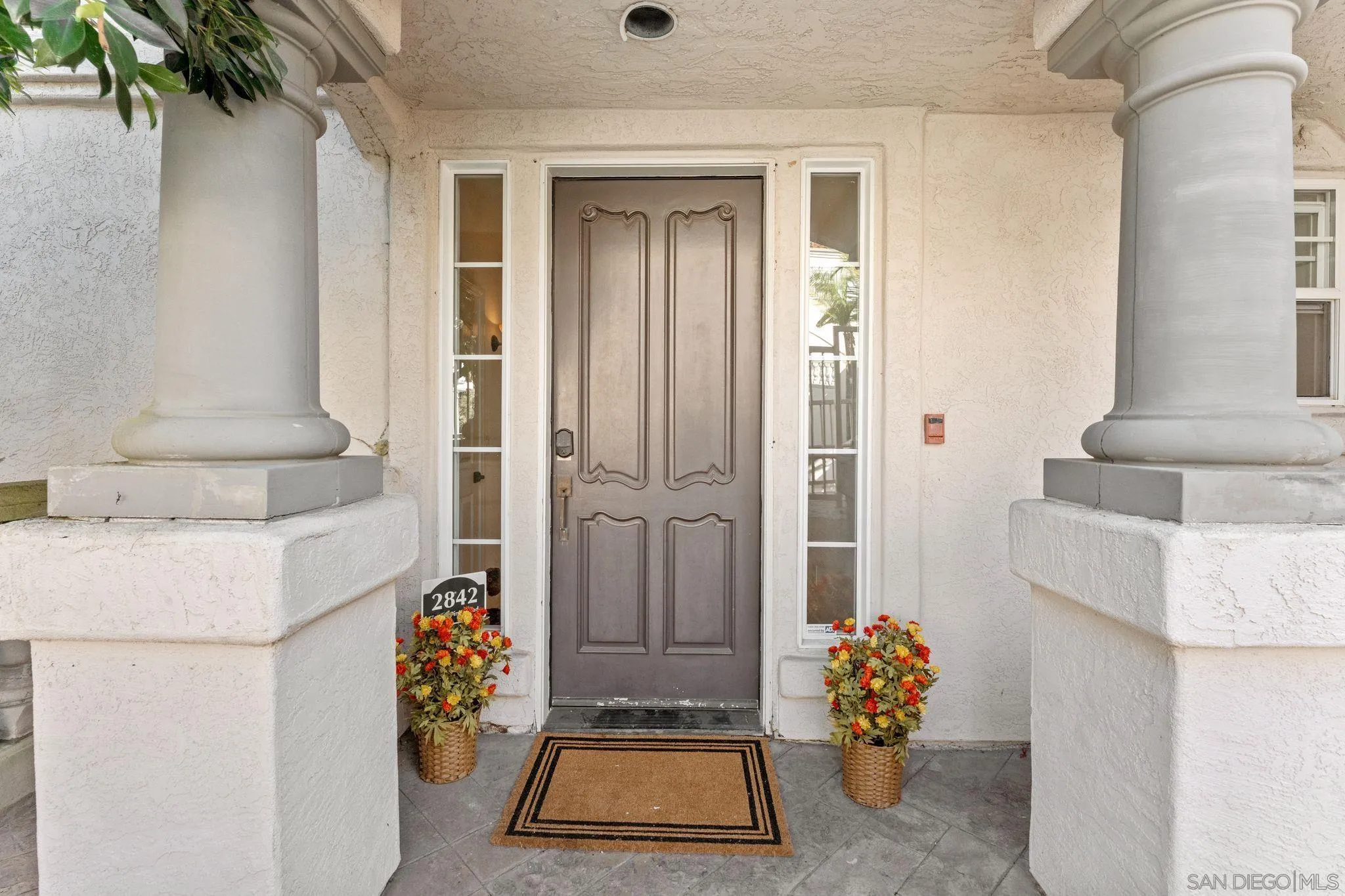 2842 Torrey Pines Road La Jolla, CA 92037 - Photo 2 of 45 a room with a door open and a couch