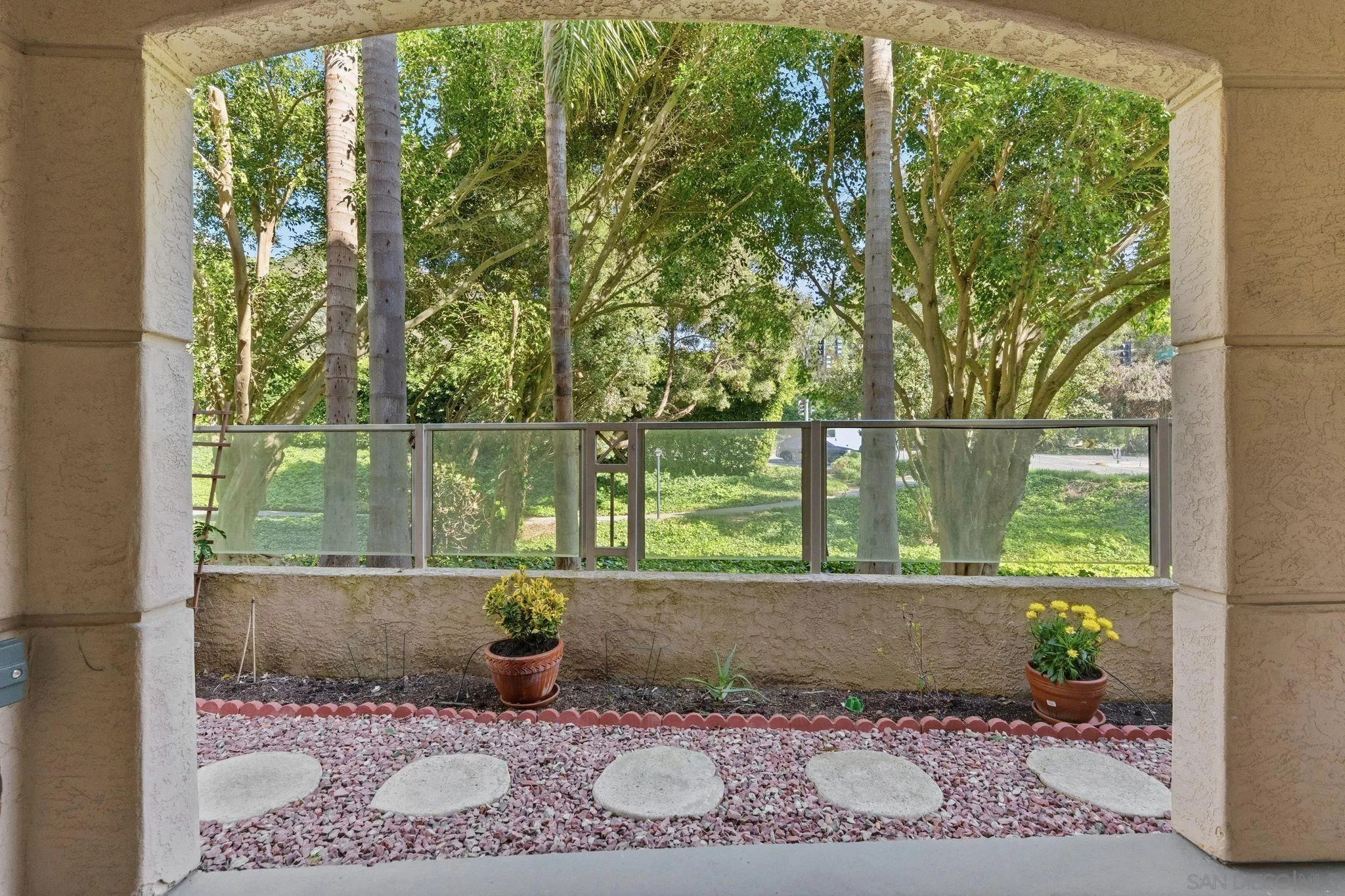 2842 Torrey Pines Road La Jolla, CA 92037 - Photo 25 of 45 a view of a garden from a bench