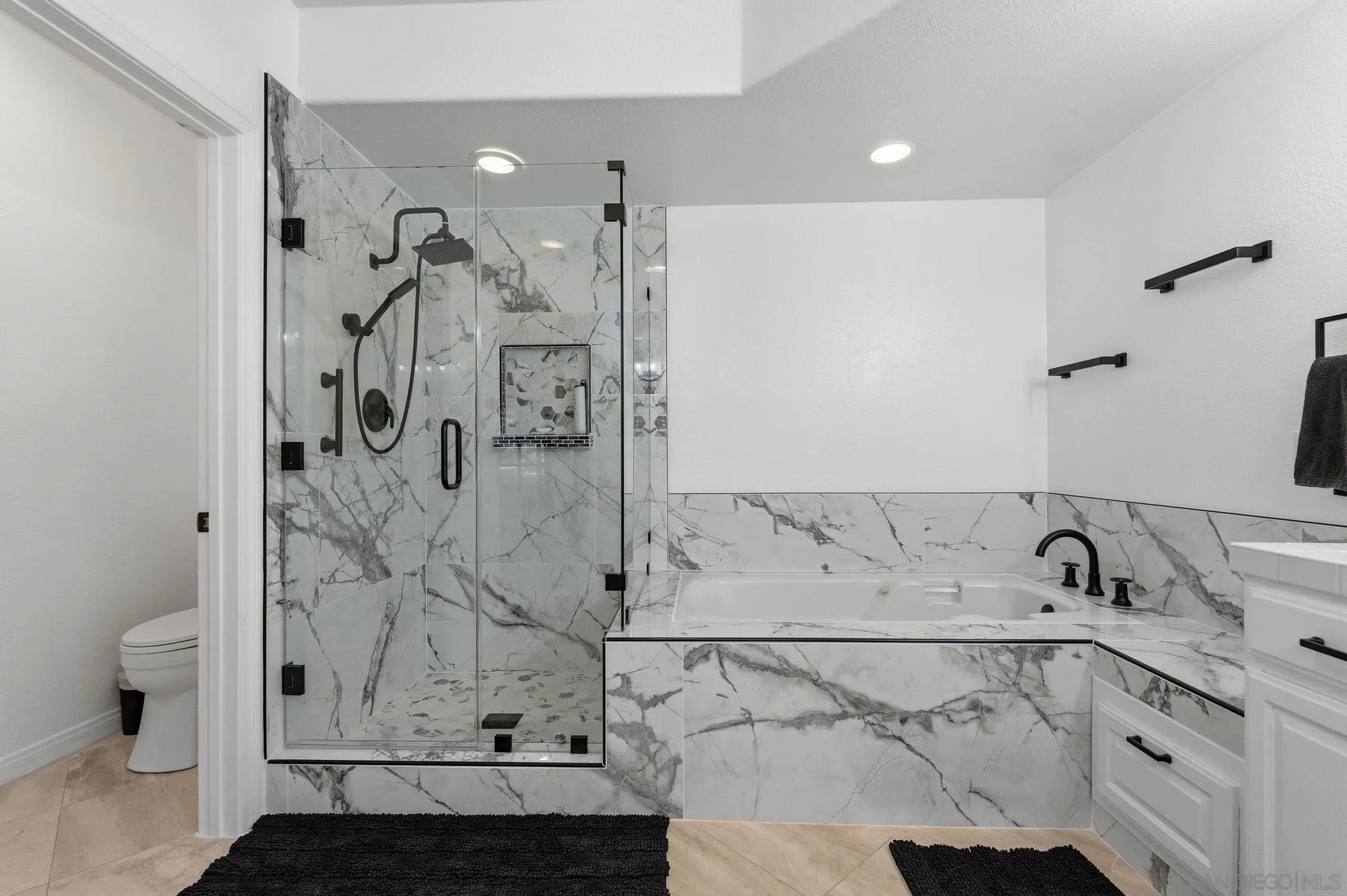 2842 Torrey Pines Road La Jolla, CA 92037 - Photo 38 of 45 a bathroom with a sink and shower