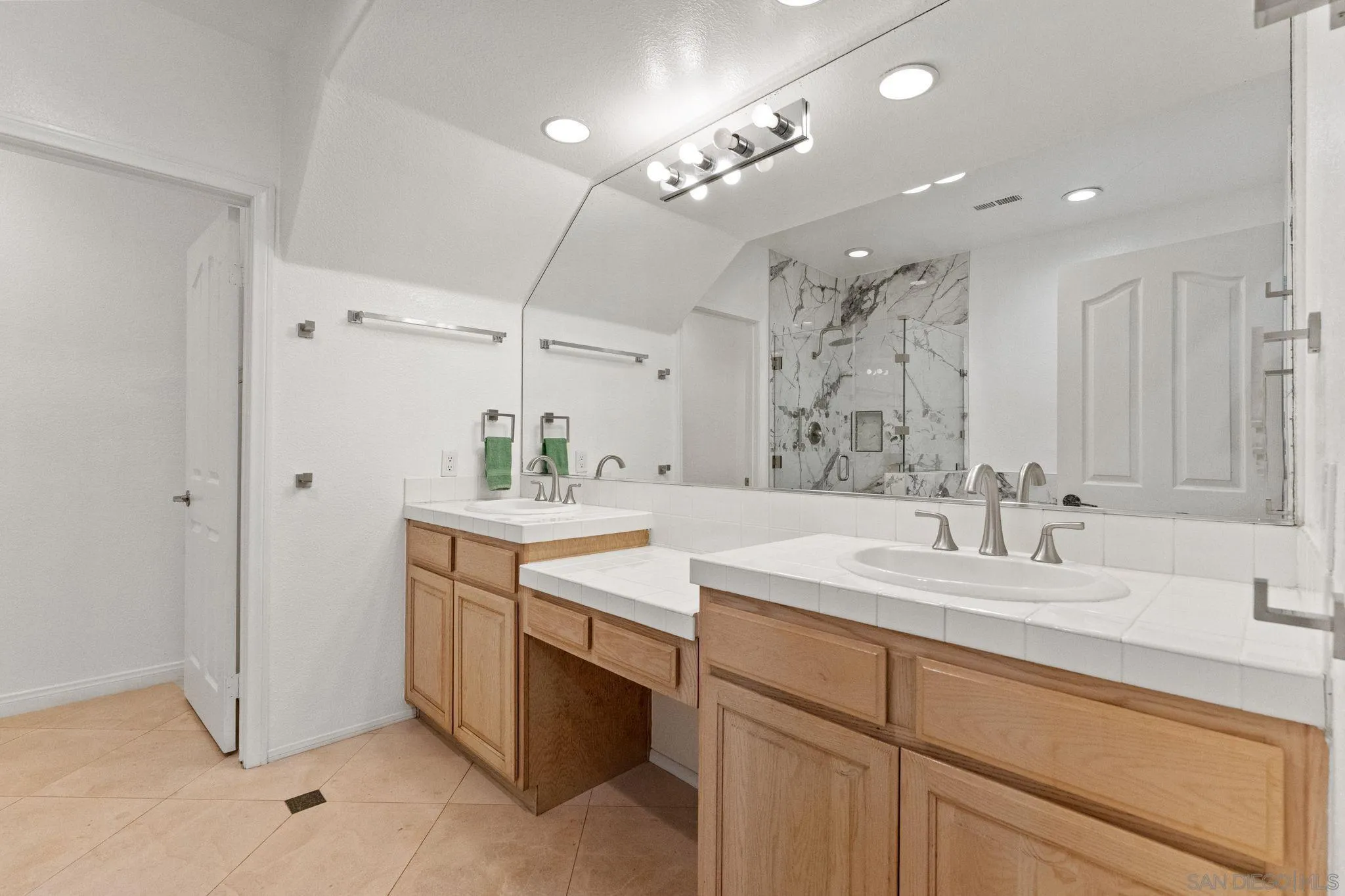 2842 Torrey Pines Road La Jolla, CA 92037 - Photo 39 of 45 a bathroom with a sink double vanity and shower