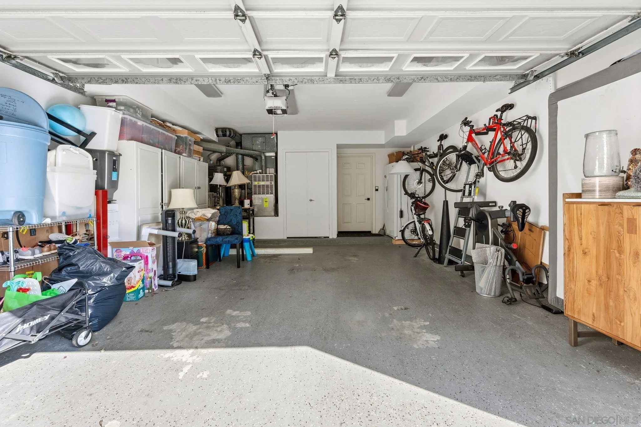 2842 Torrey Pines Road La Jolla, CA 92037 - Photo 41 of 45 a view of a garage with a bike and car