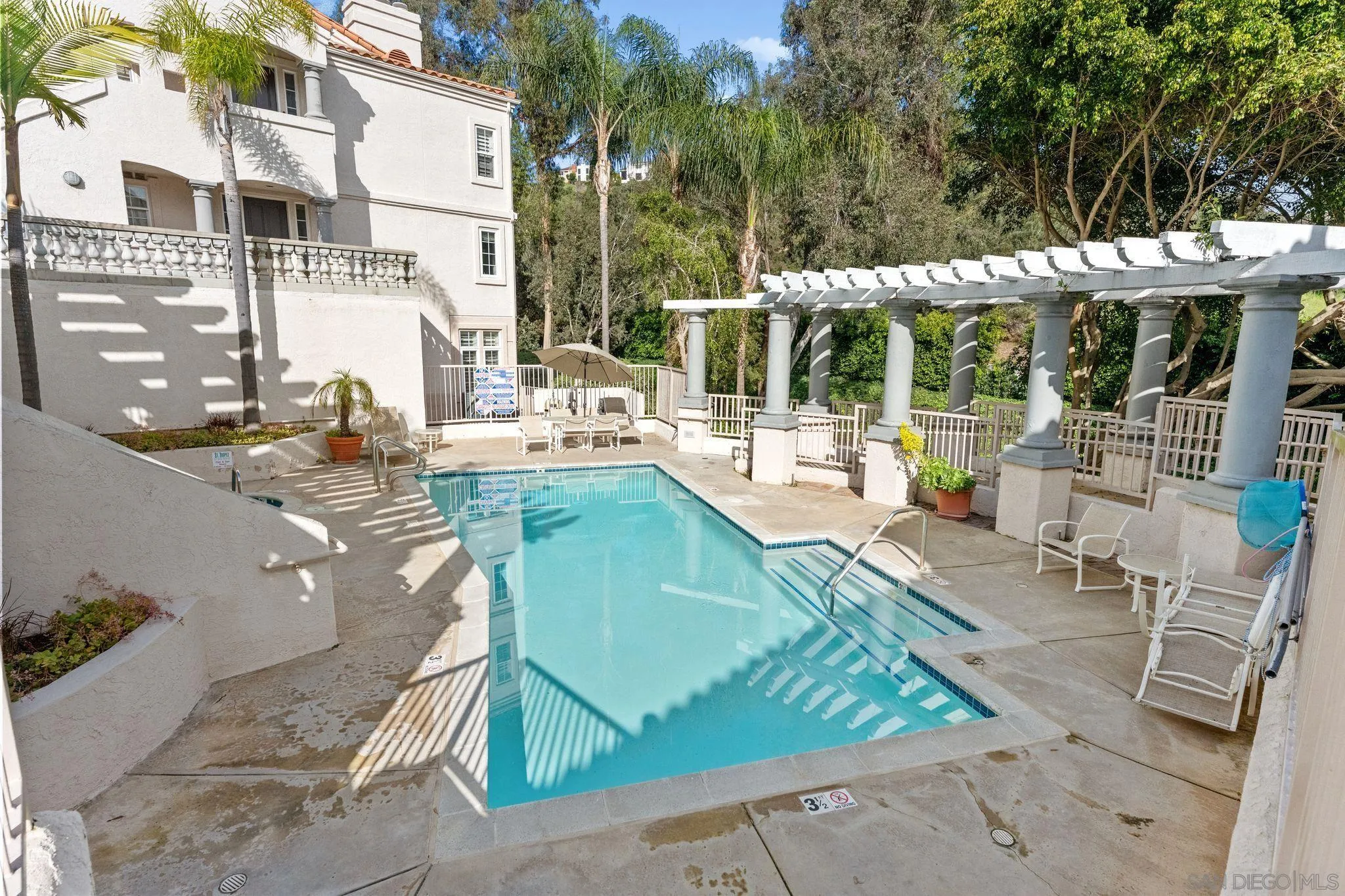 2842 Torrey Pines Road La Jolla, CA 92037 - Photo 44 of 45 a view of a patio with couches table and chairs and potted plants