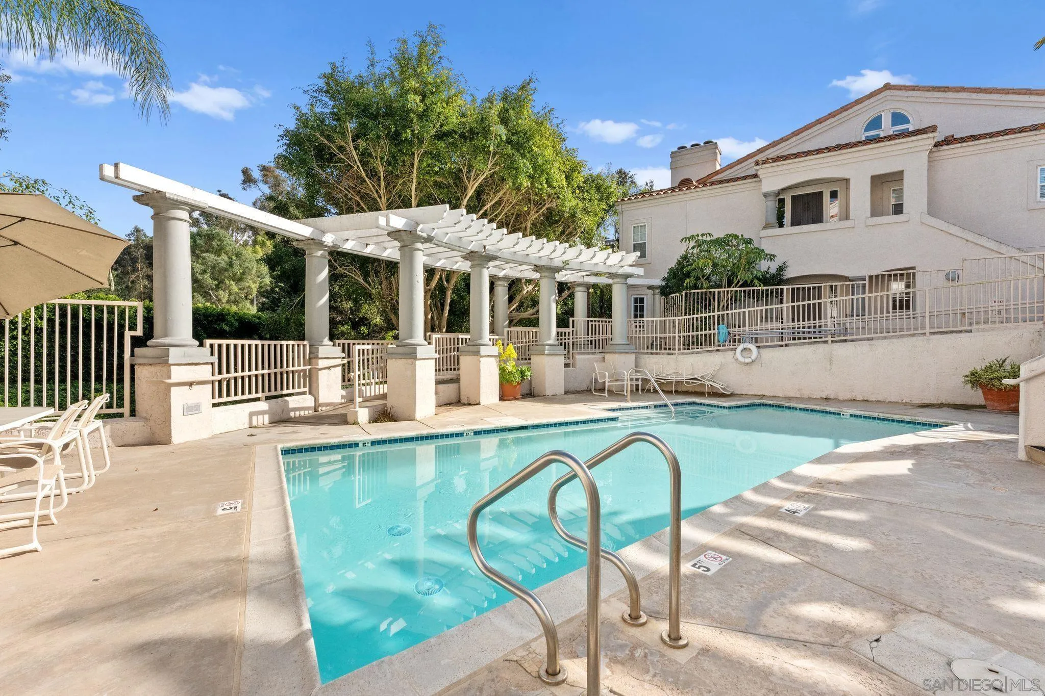 2842 Torrey Pines Road La Jolla, CA 92037 - Photo 45 of 45 a swimming pool with outdoor seating and yard