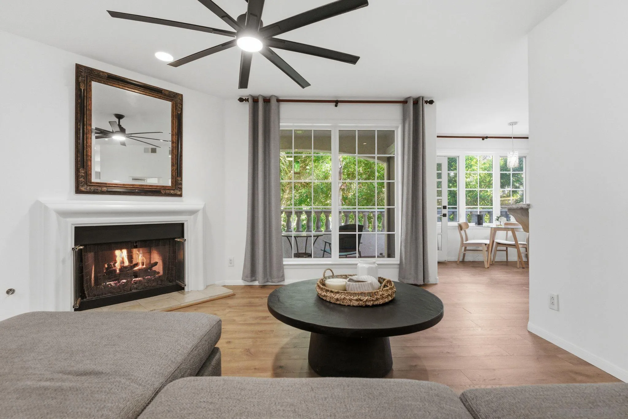 2842 Torrey Pines Road La Jolla, CA 92037 - Photo 6 of 45 a living room with furniture and a fireplace