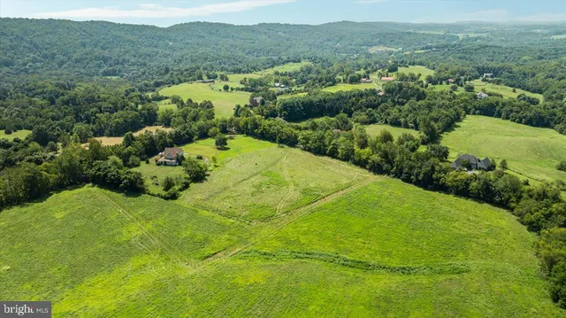 a view of a big yard with green space