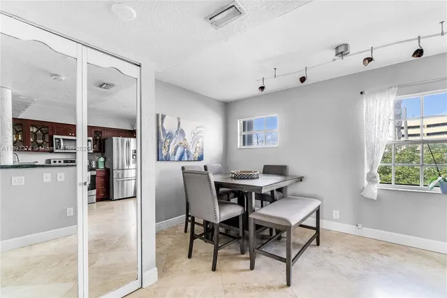 a view of a kitchen with washer and dryer
