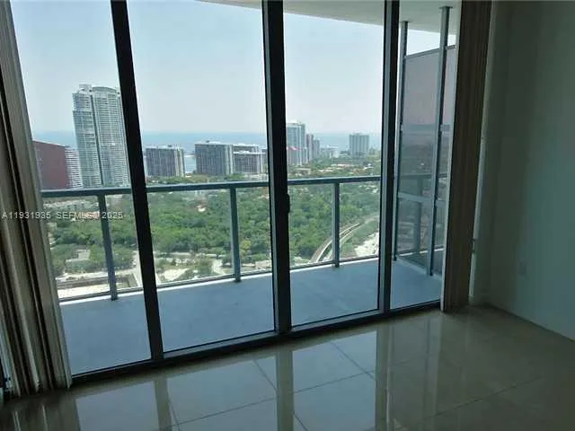a view of a large window with an outdoor space