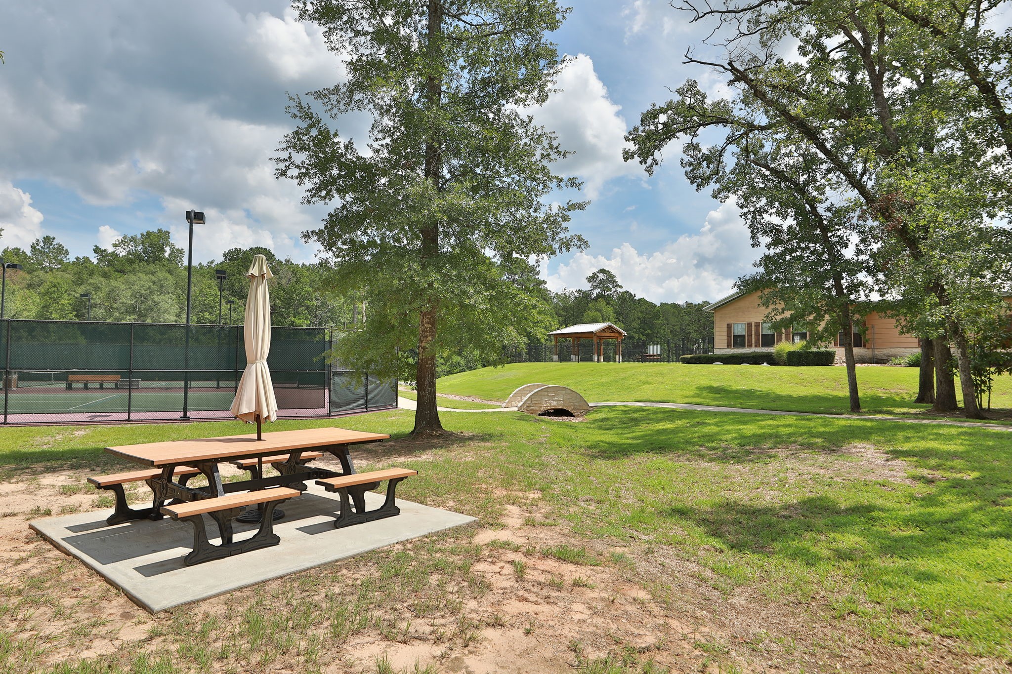 6918 Comanche Bend Montgomery, TX 77316 - Photo 49 of 50 Privacy, safety, wooded terrain, scenic roads, and the peaceful sounds of nature, the lifestyle and value of acreage living await you in High Meadow Estates.
Spanning over 1,100 acres, High Meadow Estates is planned to welcome approximately 560 families at full completion, offering a rare blend of luxury living, natural beauty, and spacious homesites. Residents enjoy rolling terrain, mature trees, scenic drives, and a true retreat-style atmosphere.
