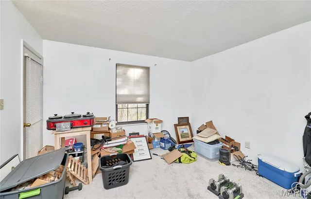 $170,000 | 2302 Canyonlands Drive, Unit E, Maryland Heights, MO 63043