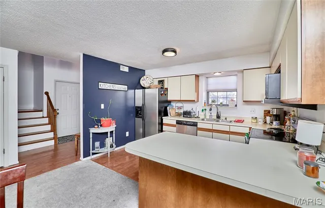 $170,000 | 2302 Canyonlands Drive, Unit E, Maryland Heights, MO 63043