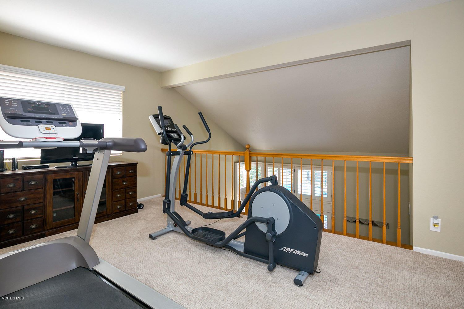 539 Galloping Hill Road Simi Valley, CA 93065 - Photo 18 of 30 a view of a room with gym equipment