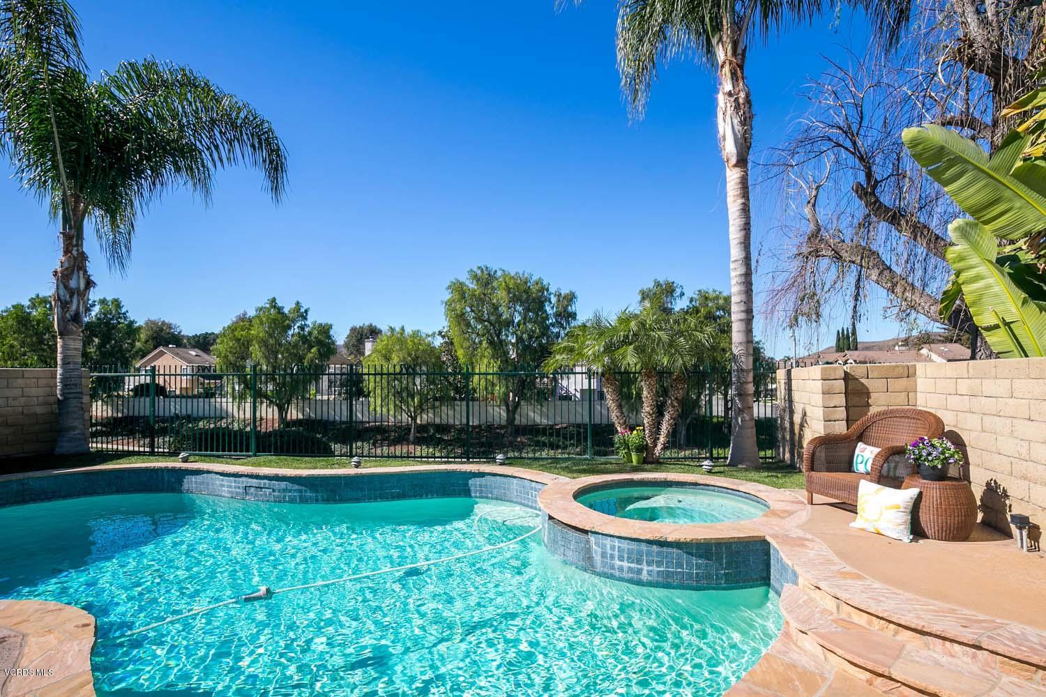 539 Galloping Hill Road Simi Valley, CA 93065 - Photo 4 of 30 a view of a swimming pool with a garden