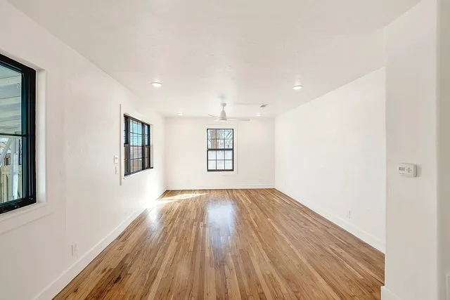 a view of an empty room and window