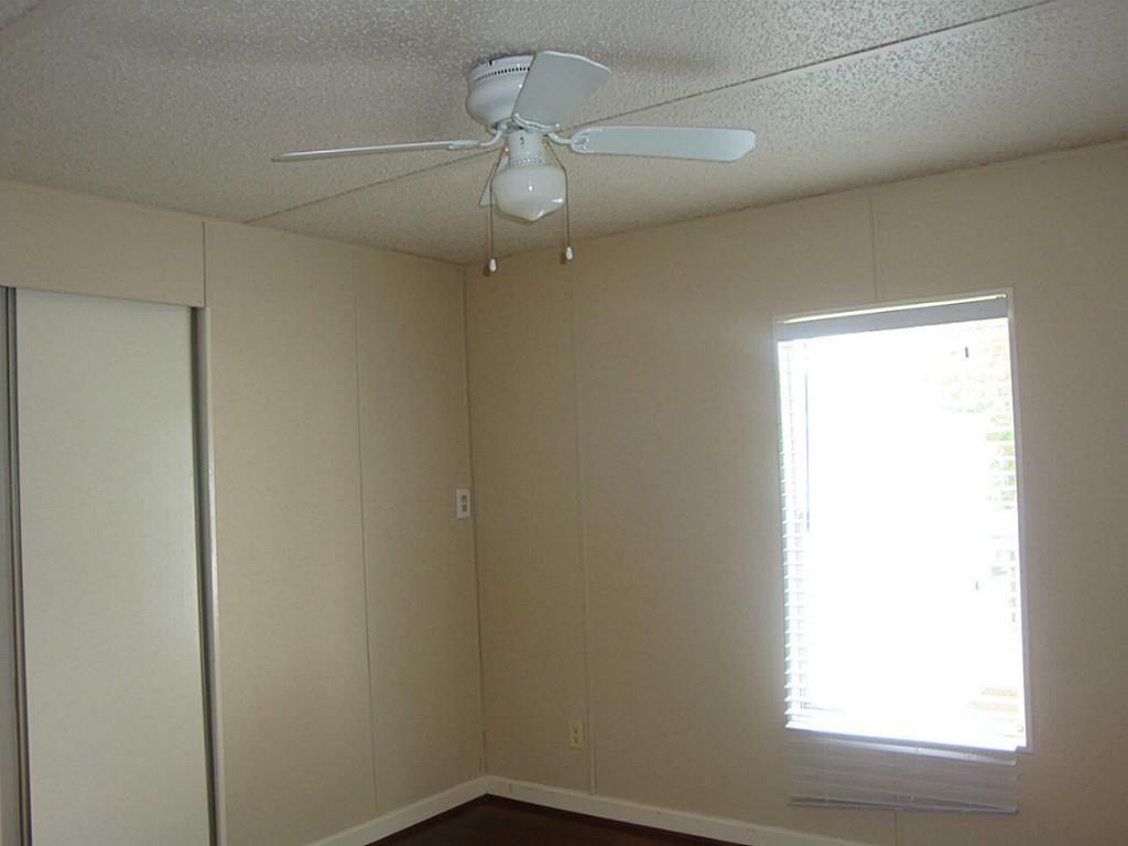 2445 Precinct Line Road Richmond, TX 77406 - Photo 6 of 9 an empty room with a window