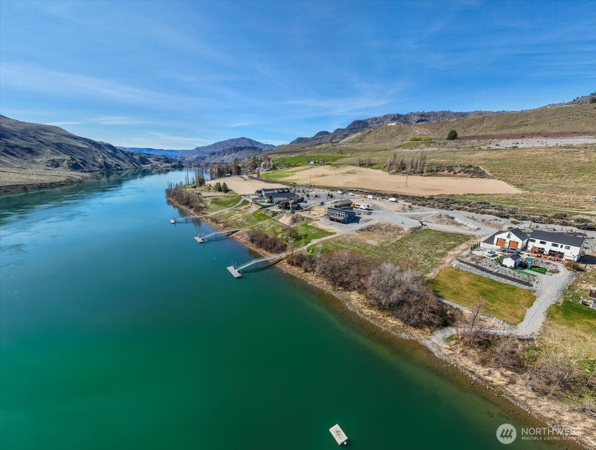 519 Hidden Lane Chelan, WA 98816 - Photo 1 of 25 a view of a lake with a mountain