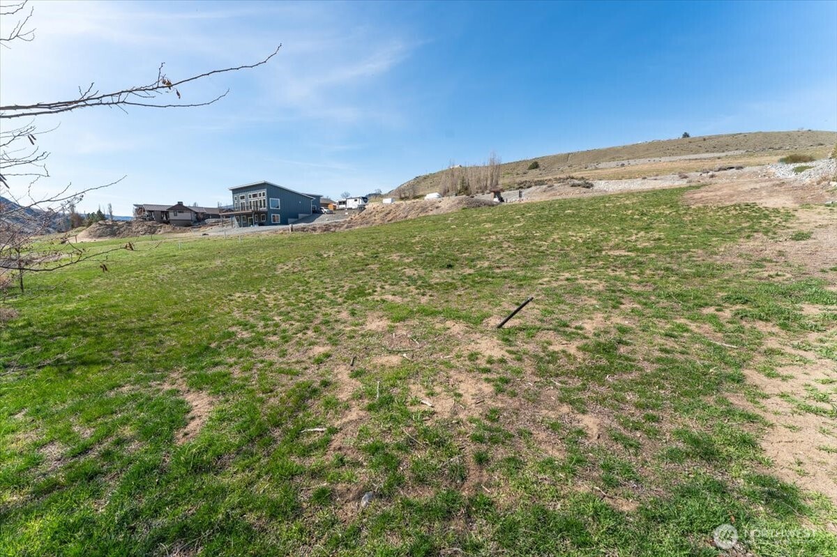 519 Hidden Lane Chelan, WA 98816 - Photo 18 of 25 a view of a field with an ocean view