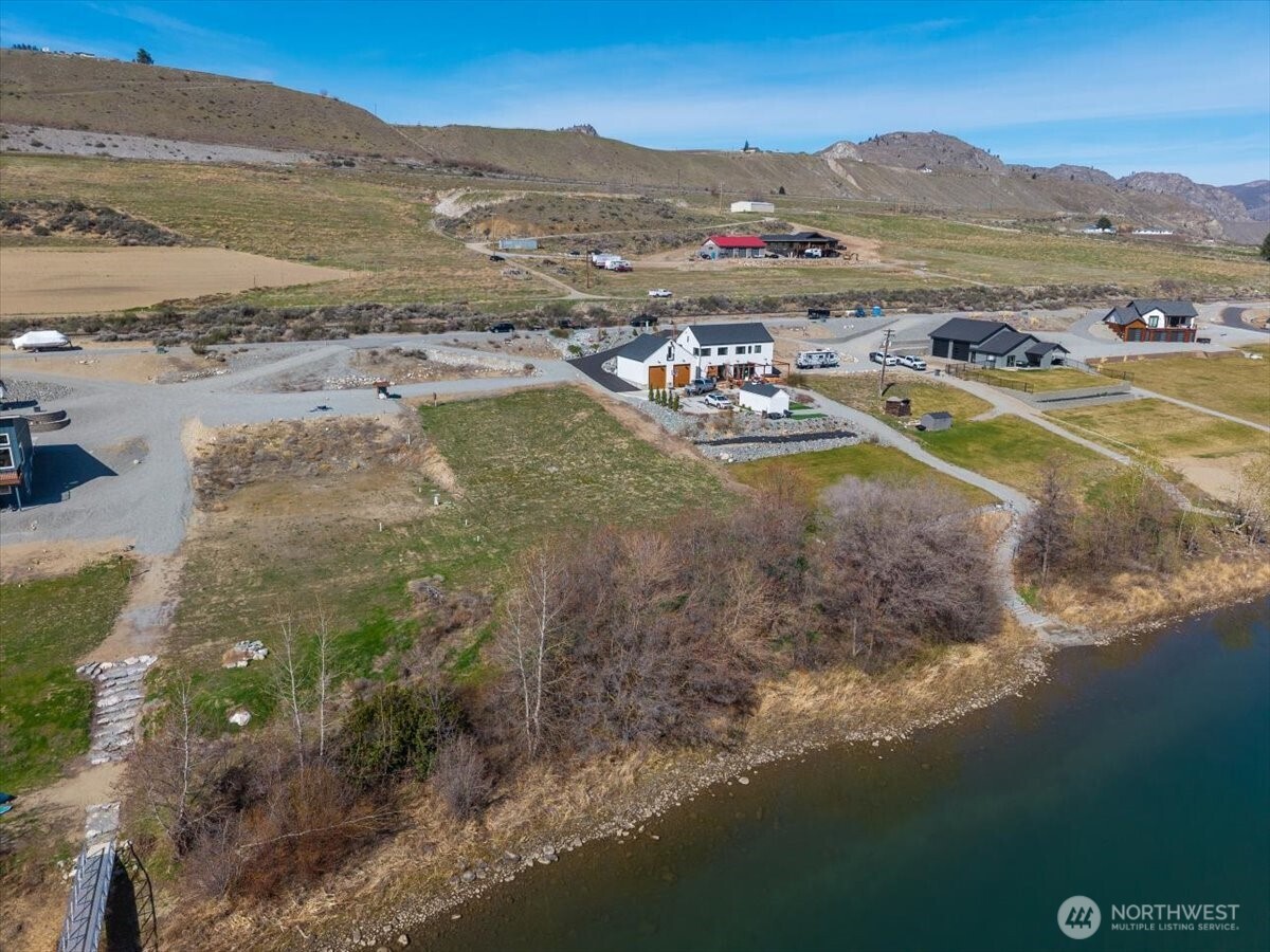 519 Hidden Lane Chelan, WA 98816 - Photo 19 of 25 a view of a lake with mountains in the background