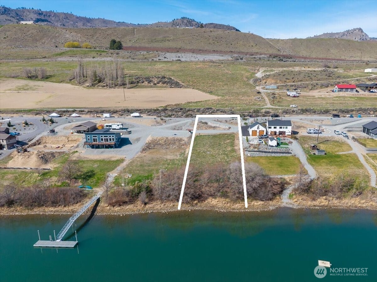 519 Hidden Lane Chelan, WA 98816 - Photo 24 of 25 a view of a lake with a mountain