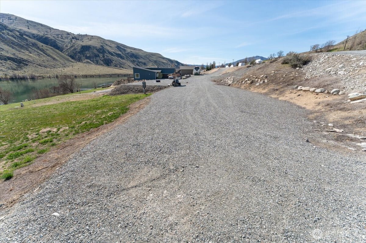 519 Hidden Lane Chelan, WA 98816 - Photo 10 of 25 a view of a road with an ocean view