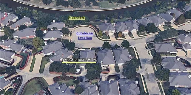 an aerial view of waterside residential building