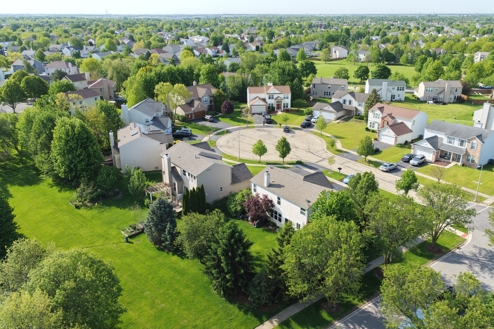 6 Forsythia Court Bolingbrook, IL 60490 - Photo 27 of 28 an aerial view of a houses with a lake view