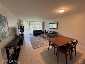 a view of a livingroom with furniture and window