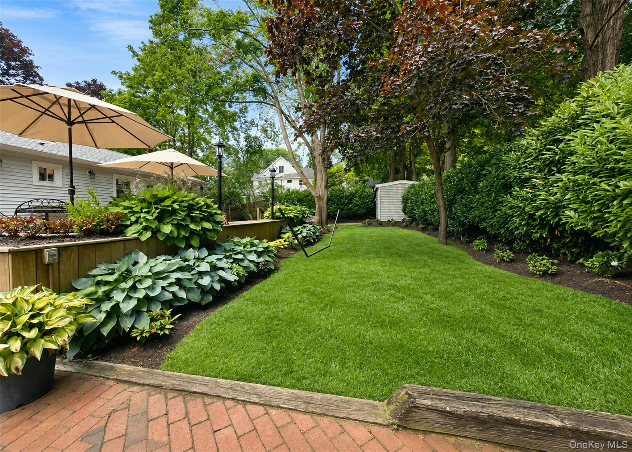 17 Beech Road Rocky Point, NY 11778 - Photo 22 of 26 Plenty Of Colorful Plantings & Foliage Surround The Property