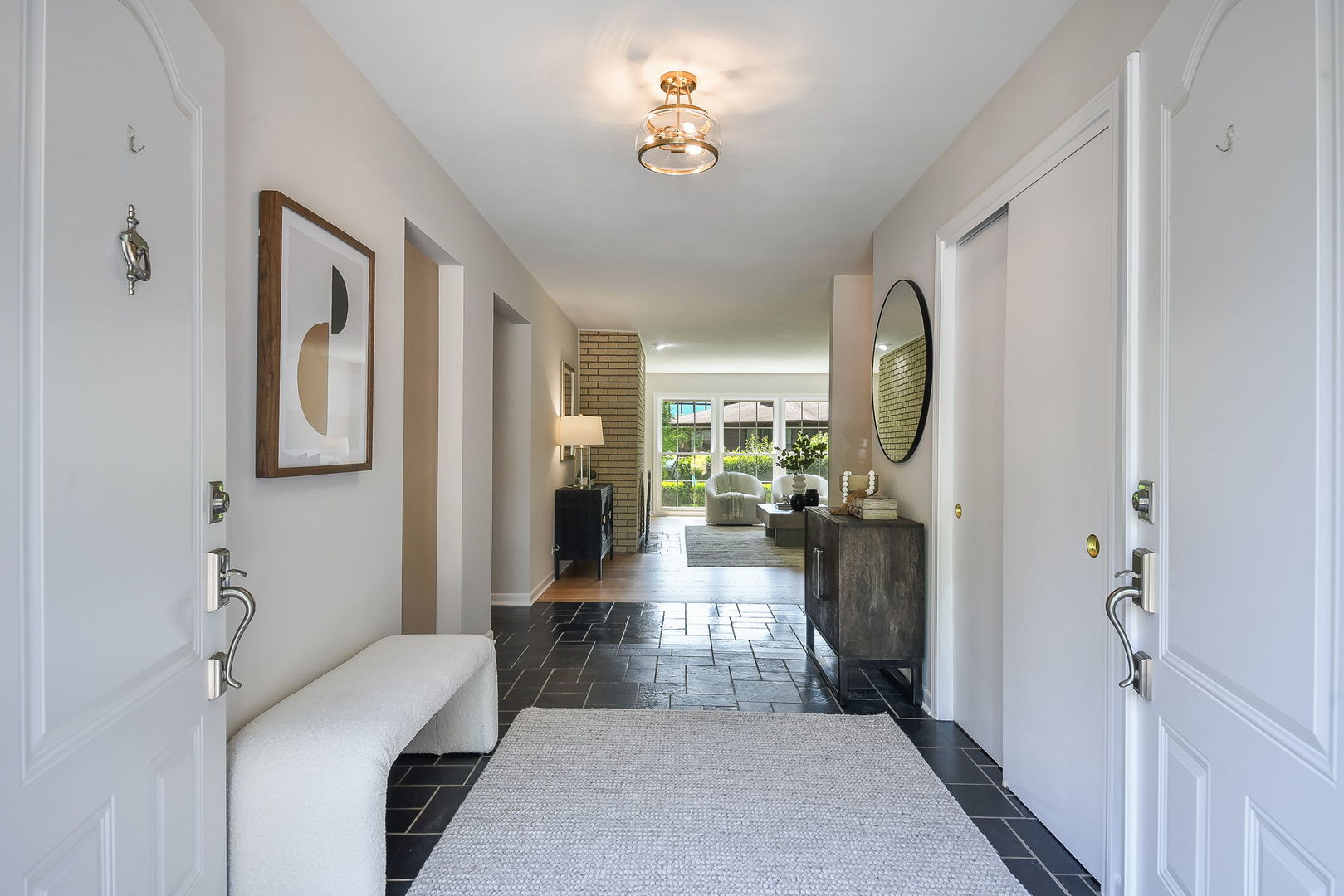541 Williamsburg Road Glen Ellyn, IL 60137 - Photo 5 of 45 a view of a hallway with a livingroom and dining room