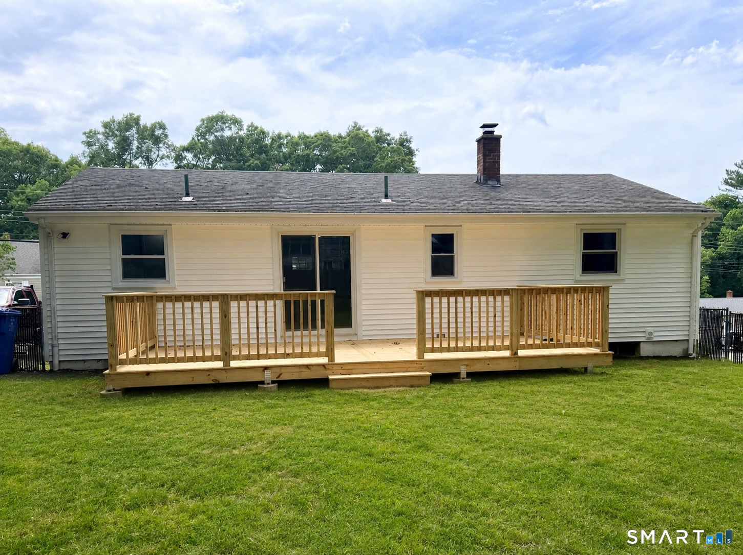 51 Beechwood Road Montville, CT 06370 - Photo 25 of 27 Rear Exterior with Brand-New Deck & Fully Fenced Yard