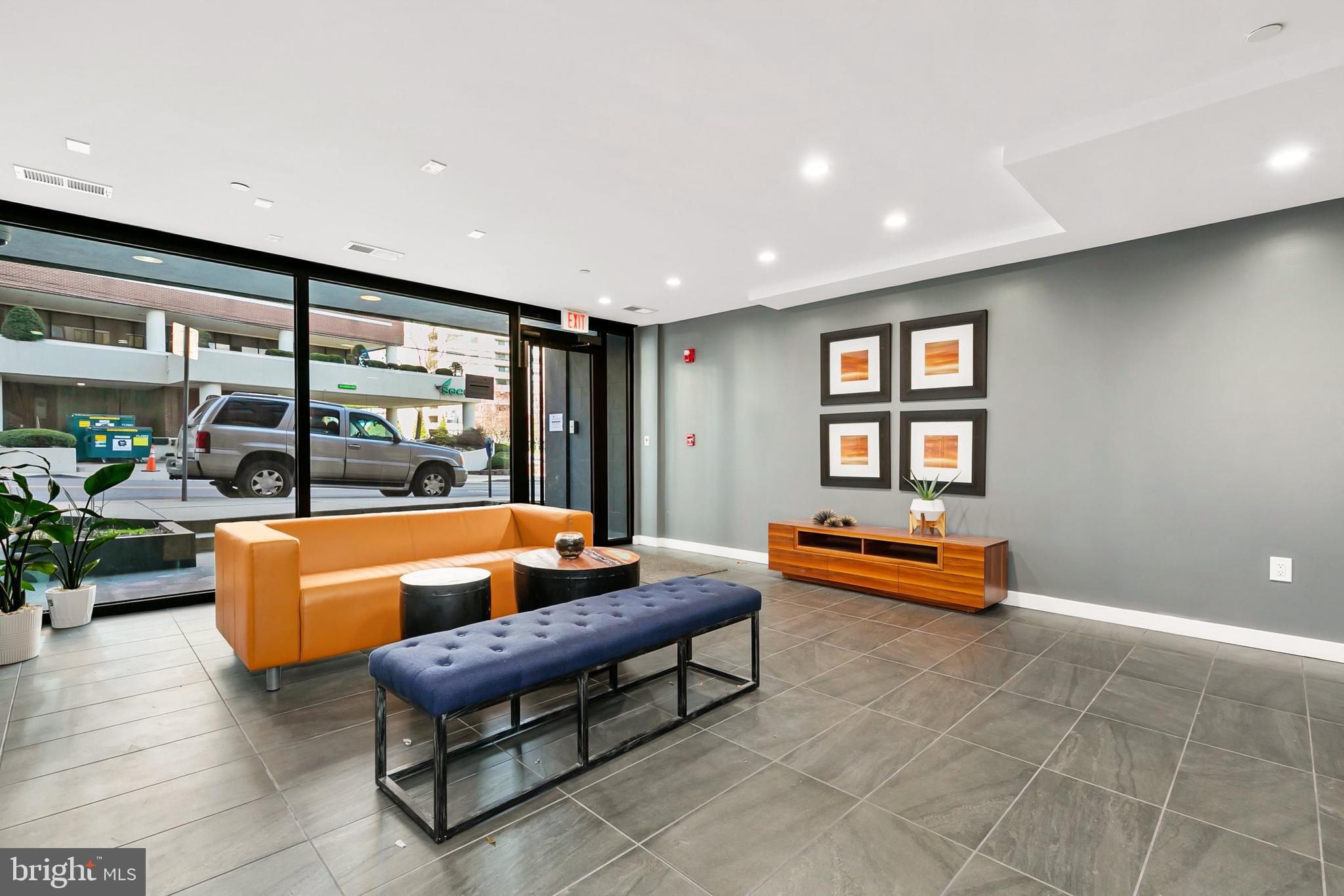 700 Roeder Road, Unit 603 Silver Spring, MD 20910 - Photo 15 of 21 a living room with furniture a pool table and a large window