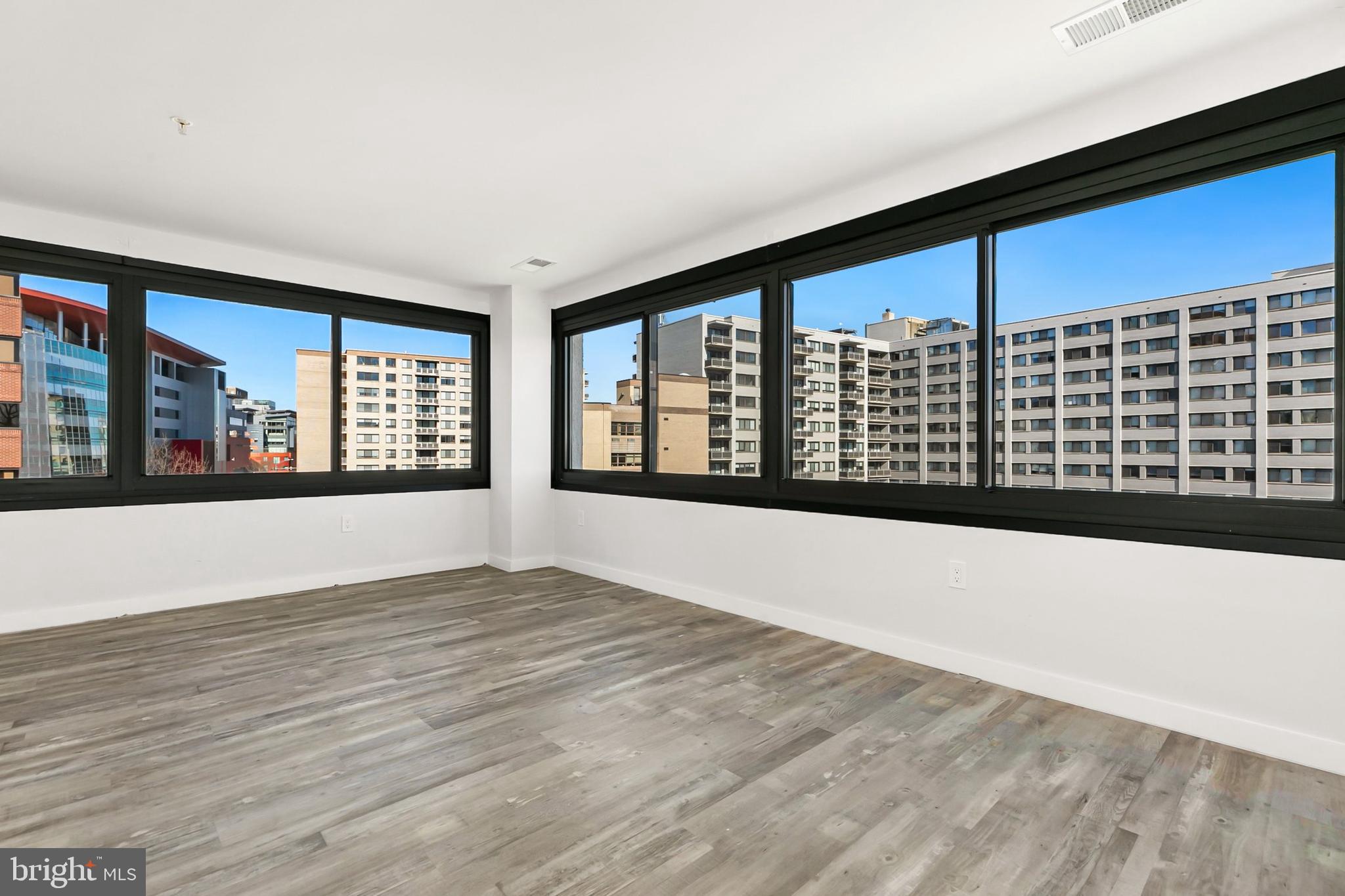 700 Roeder Road, Unit 603 Silver Spring, MD 20910 - Photo 2 of 21 a view of an empty room with a window
