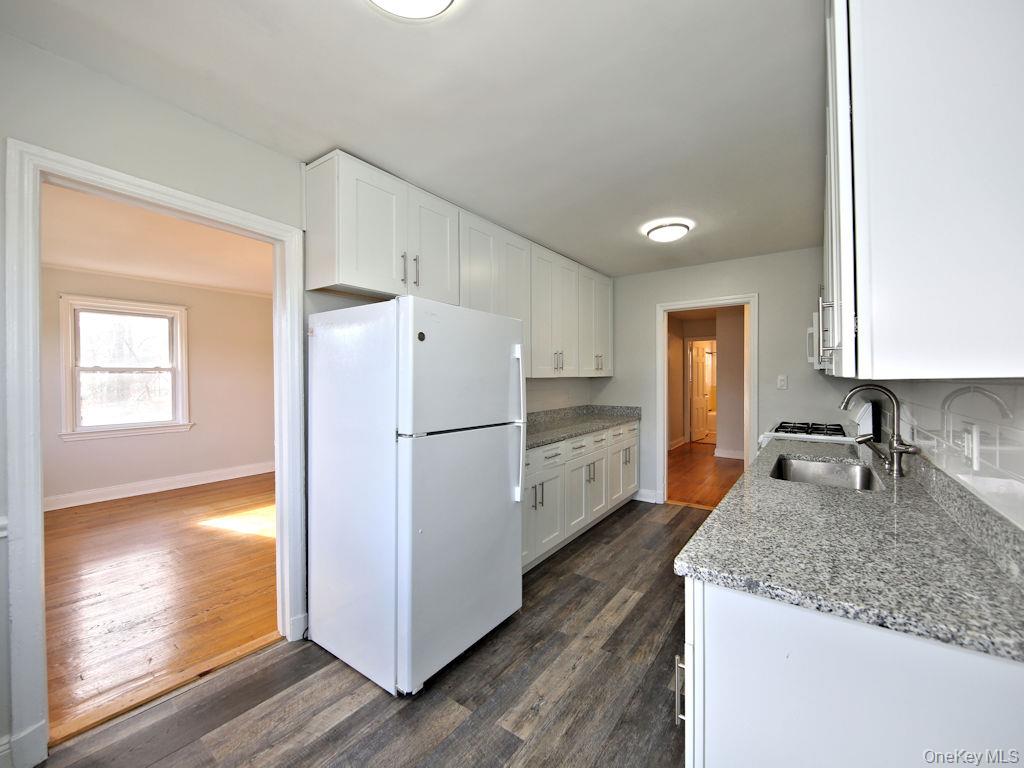 5 Laurel Street, Unit A3 Rye, NY 10580 - Photo 3 of 8 a kitchen with a refrigerator sink and stove