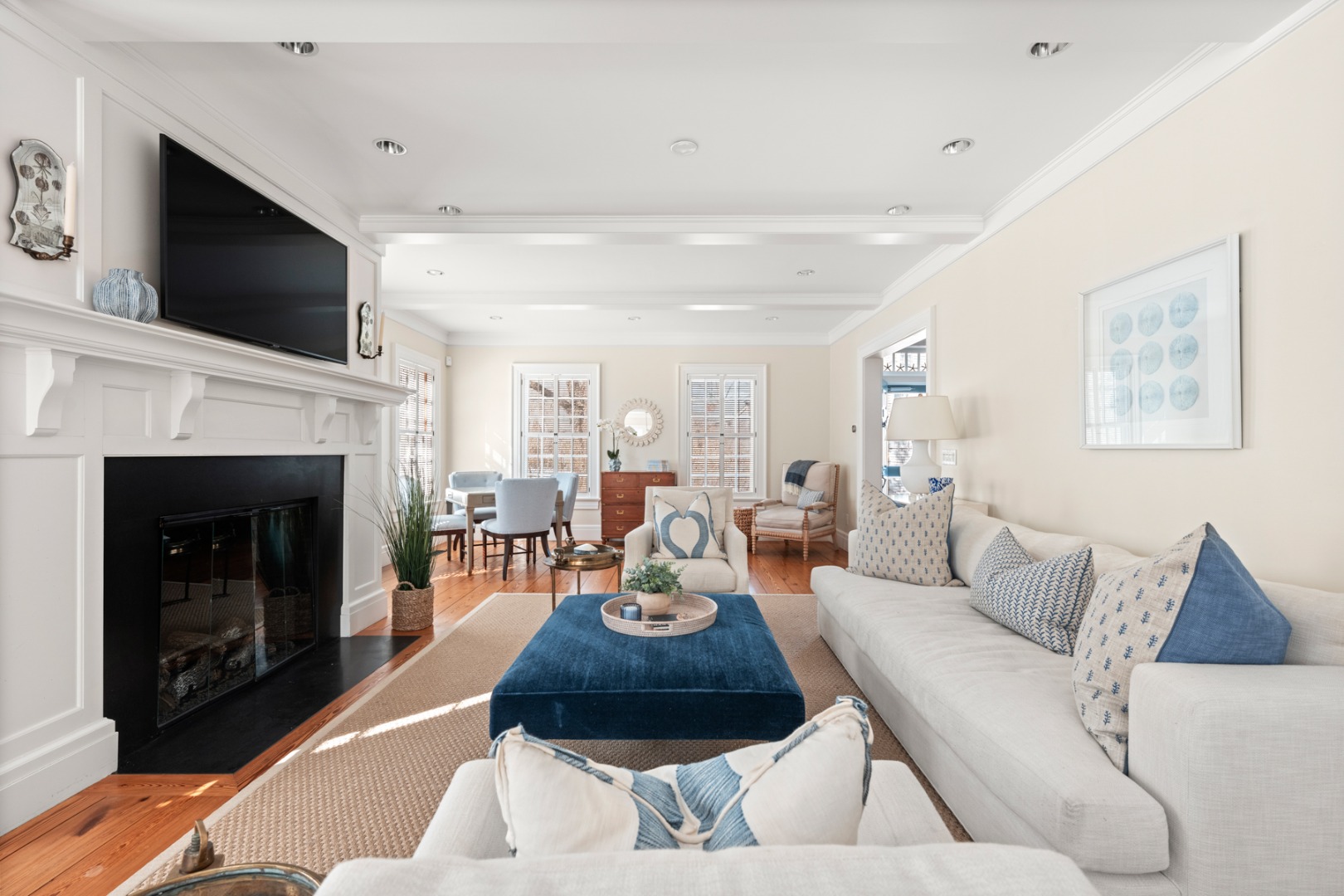 18 Mill Street Nantucket, MA 02554 - Photo 7 of 47 a living room with furniture and a fireplace