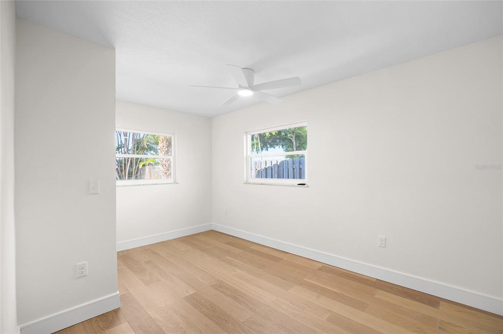 360 145th Avenue Madeira Beach, FL 33708 - Photo 30 of 64 an empty room with a window